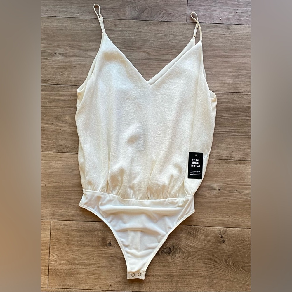 NWT Express Bodysuit